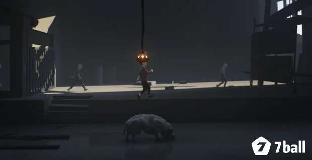 Cậu bé kéo dây điện màu vàng ra khỏi quả cầu bí mật trong Inside